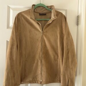 Women’s faux suede in a  tan color and lined in a plaid in a size XL